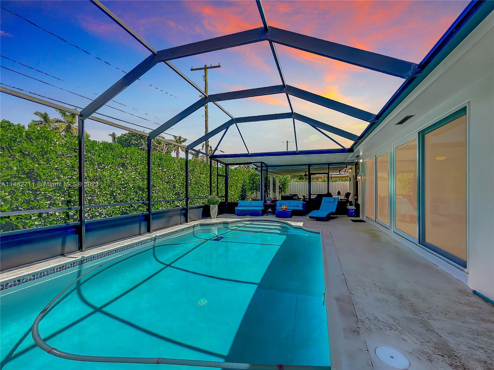 9035 Southwest 48th Terrace Miami, FL 33165 - Photo 19 of 37 a view of an indoor swimming pool