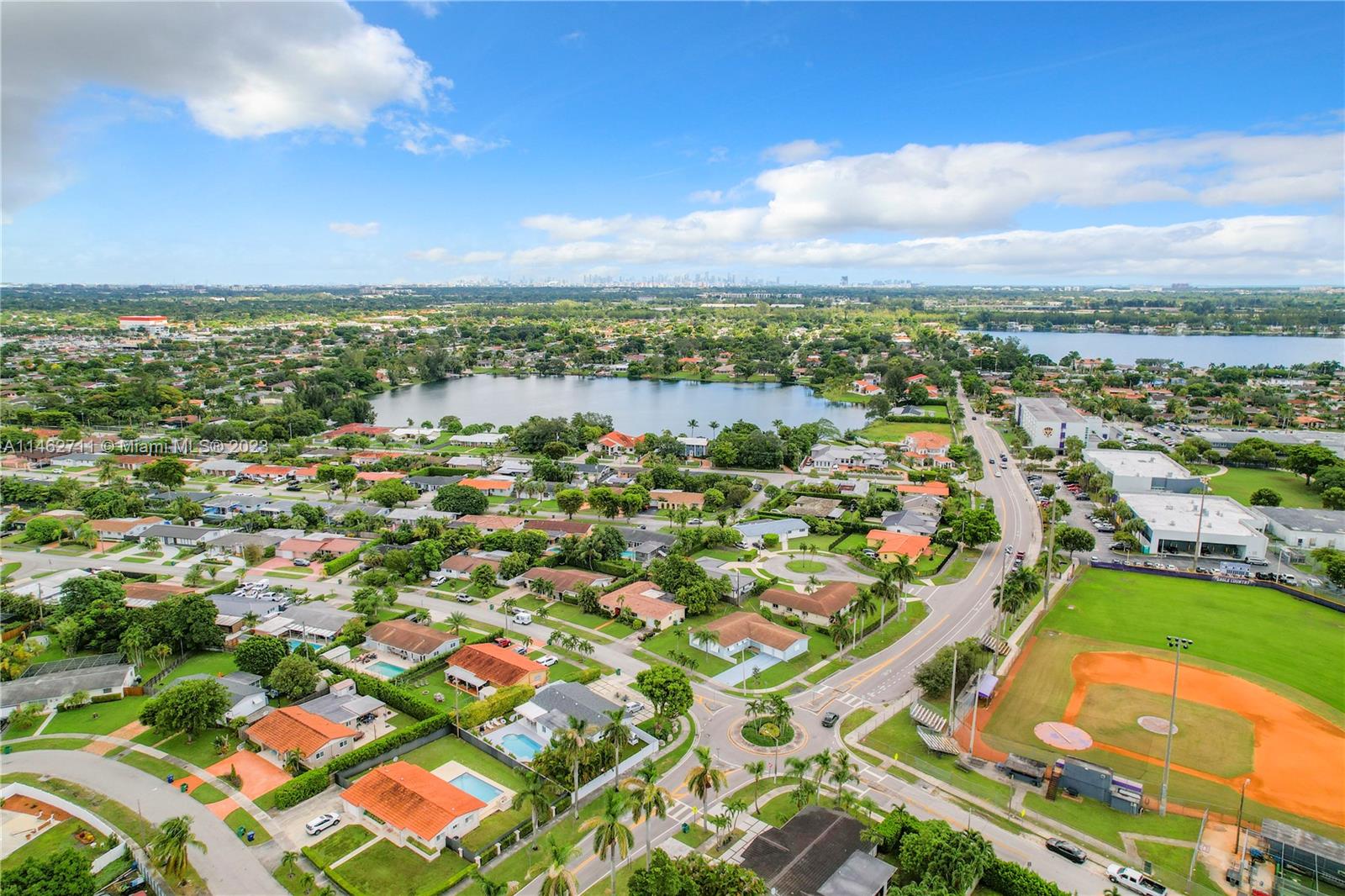 9035 Southwest 48th Terrace Miami, FL 33165 - Photo 36 of 37 an aerial view of residential houses with outdoor space and street view