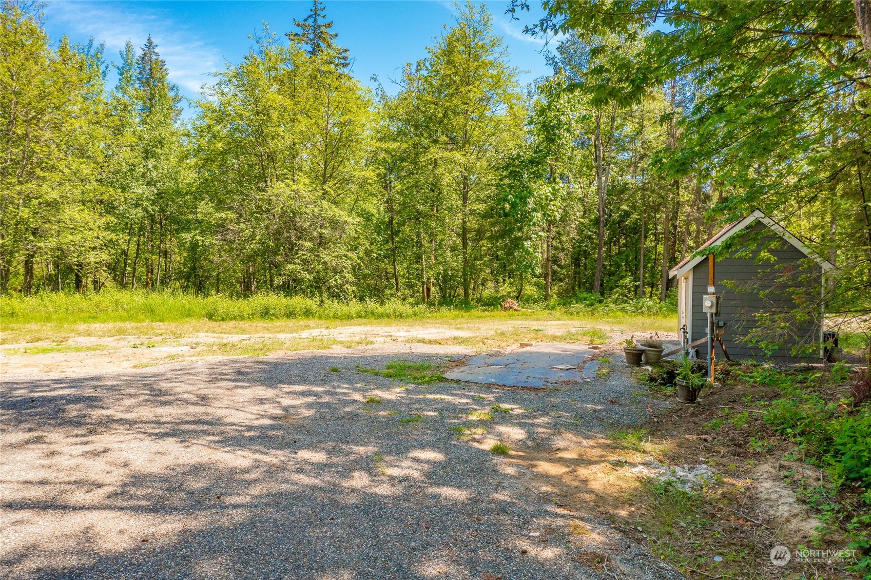 9092 Stein Road Custer, WA 98240 - Photo 1 of 24 a view of swimming pool with an outdoor space and seating area