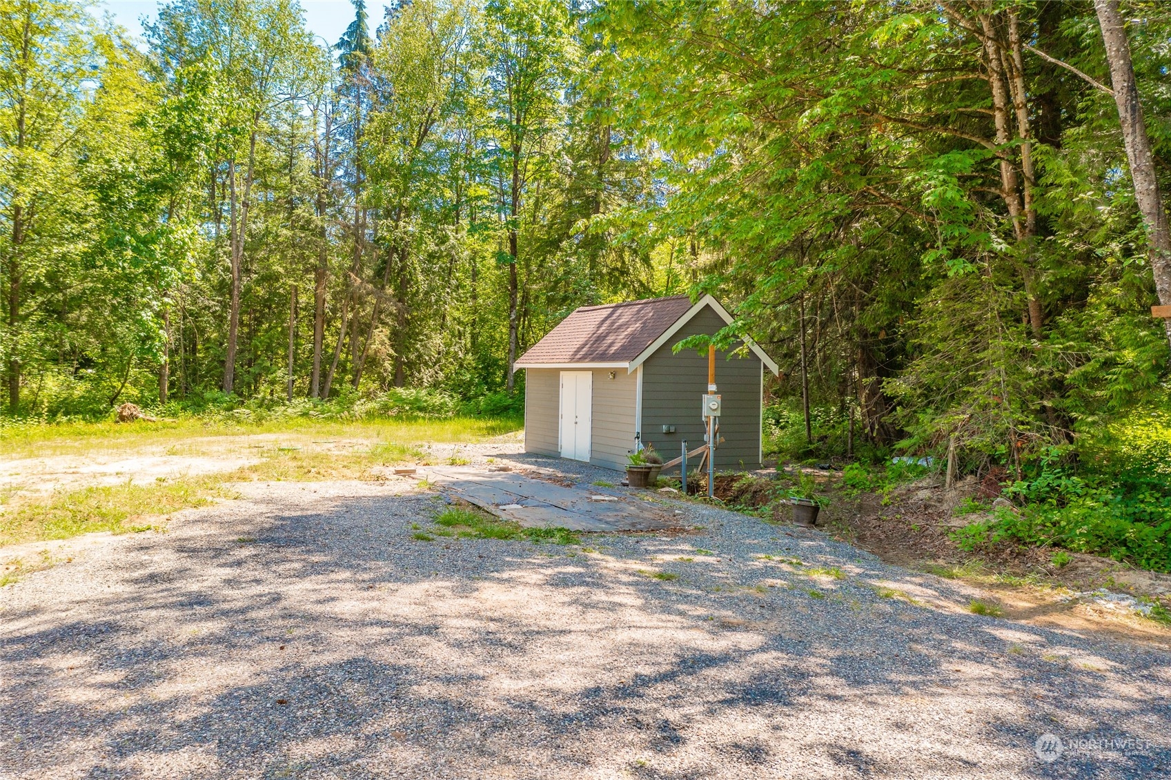 9092 Stein Road Custer, WA 98240 - Photo 2 of 24 a view of a house with a yard and garage