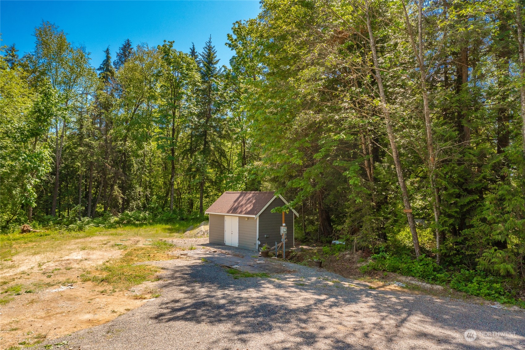 9092 Stein Road Custer, WA 98240 - Photo 21 of 24 a view of a barn in the middle of a yard