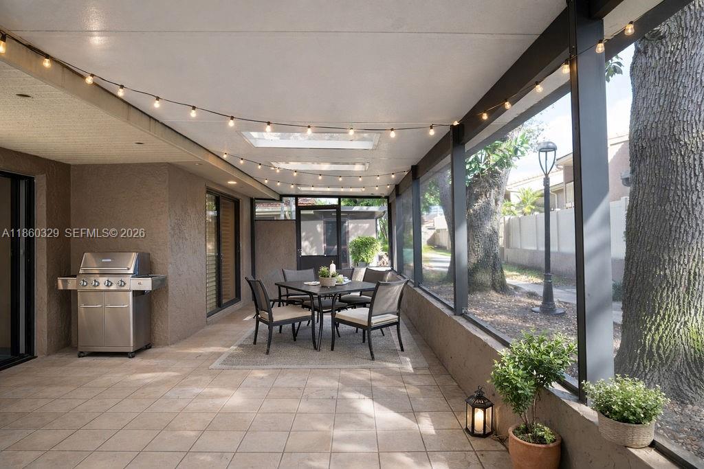 400 St Andrews Road, Unit 56 Hollywood, FL 33021 - Photo 18 of 18 a view of a dining room with furniture window and outside view