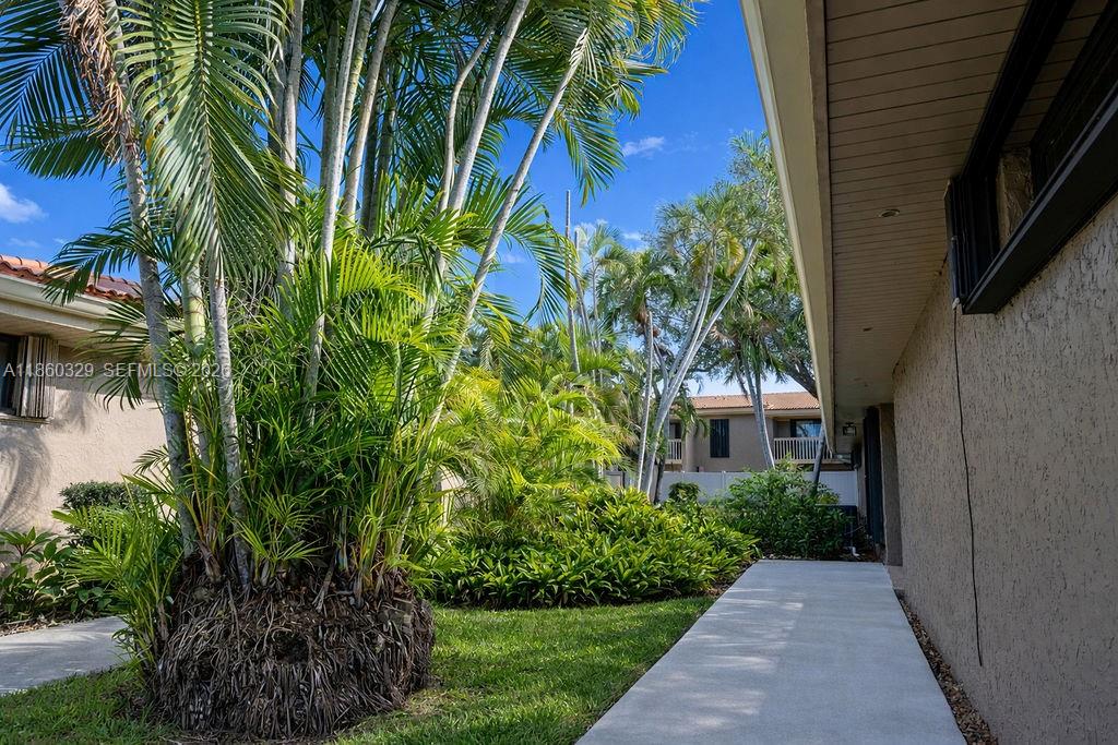 400 St Andrews Road, Unit 56 Hollywood, FL 33021 - Photo 3 of 18 a view of a garden