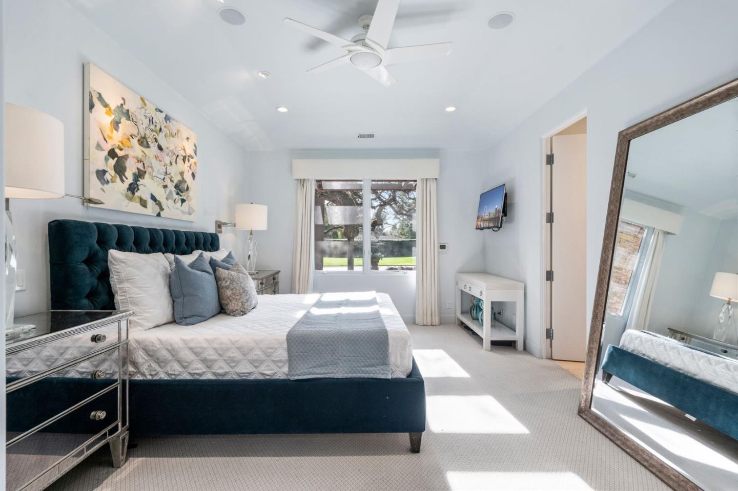 2 Lane Place Atherton, CA 94027 - Photo 17 of 35 a bedroom with a large bed and a window