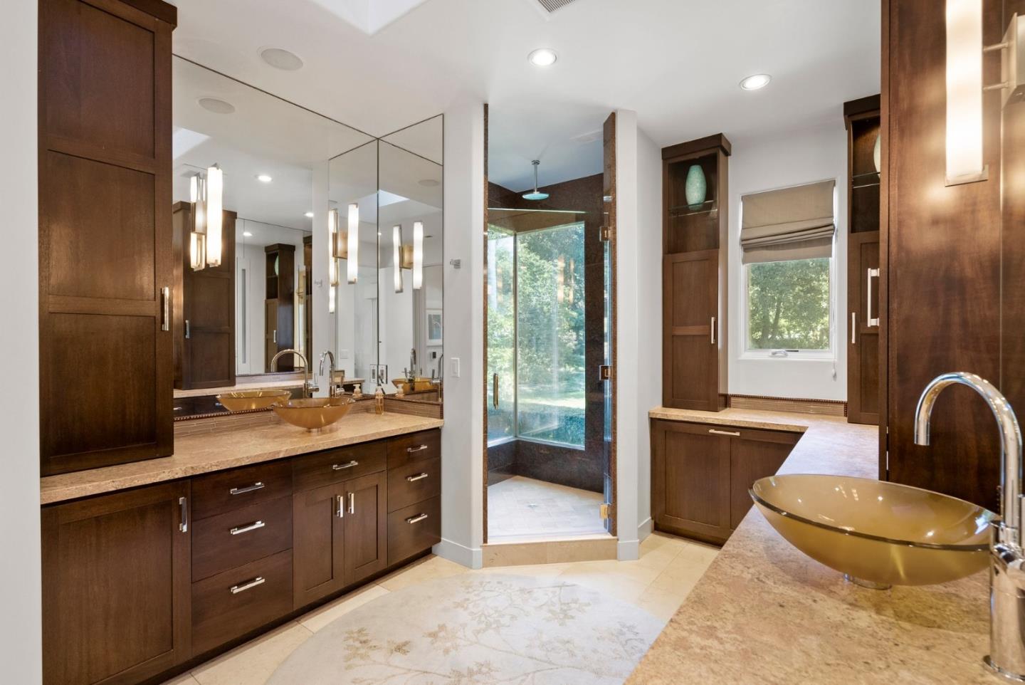 2 Lane Place Atherton, CA 94027 - Photo 18 of 35 a bathroom with a double vanity sink a toilet a mirror and shower