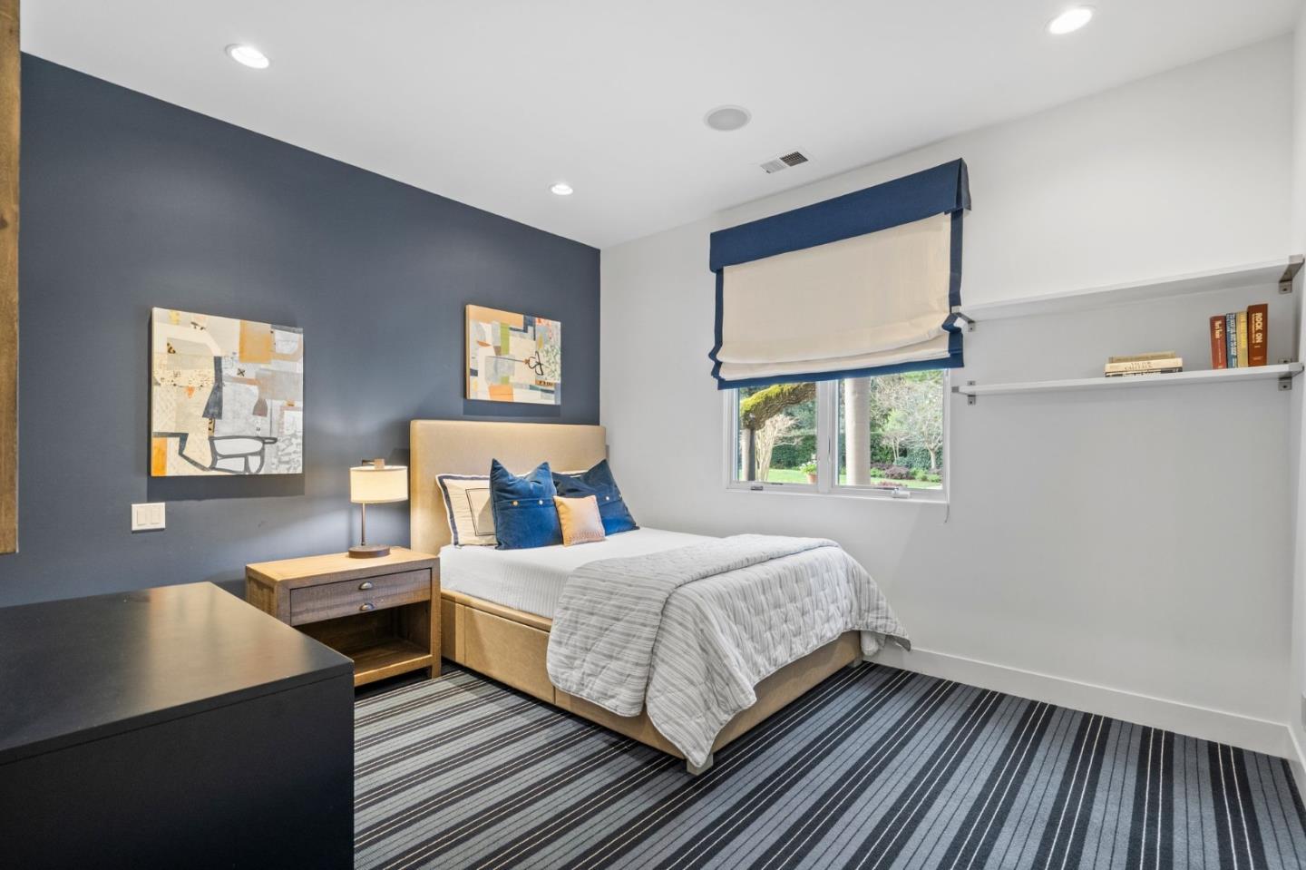 2 Lane Place Atherton, CA 94027 - Photo 20 of 35 a bedroom with a bed and wooden floor