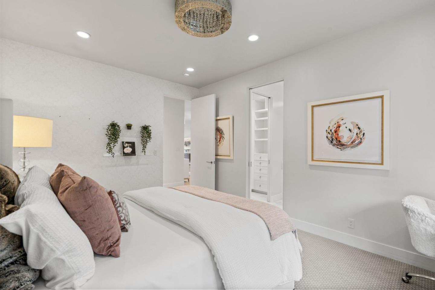 2 Lane Place Atherton, CA 94027 - Photo 21 of 35 a spacious bedroom with a bed and a painting on the wall