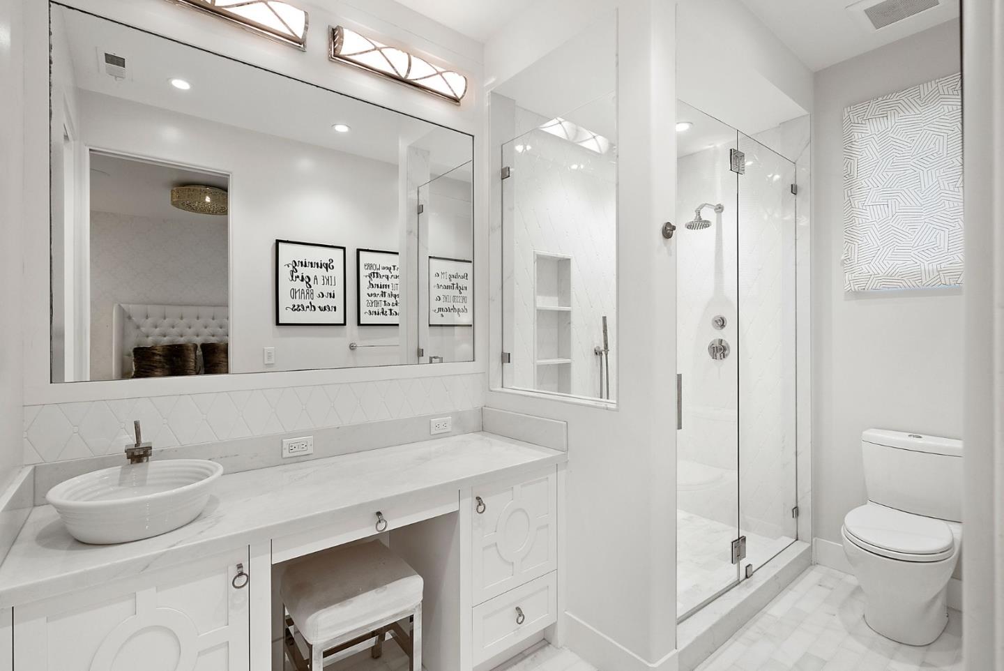 2 Lane Place Atherton, CA 94027 - Photo 22 of 35 a bathroom with a sink toilet a mirror and shower