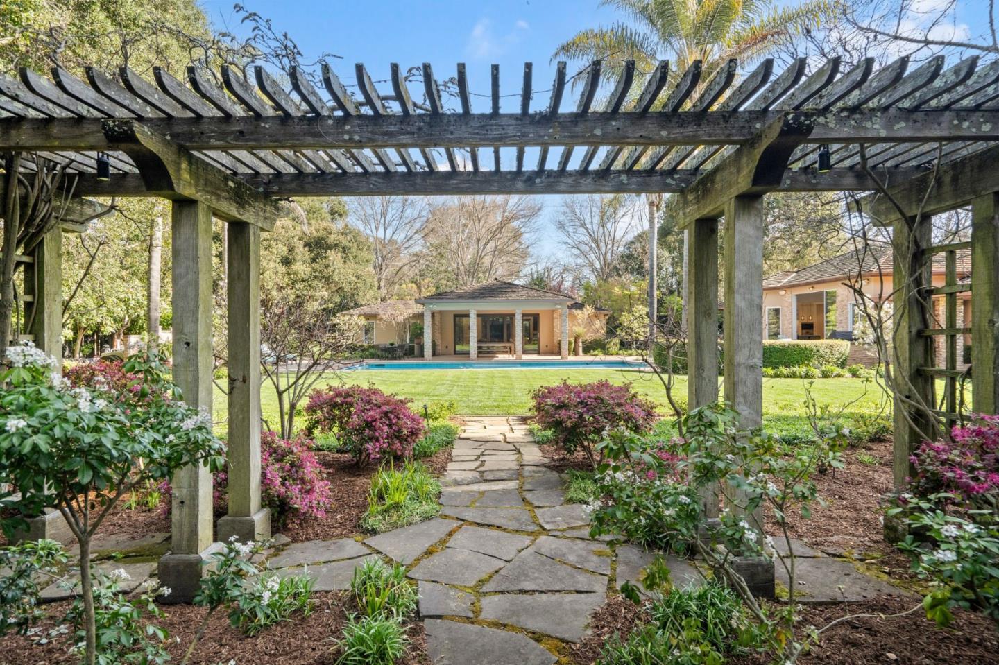 2 Lane Place Atherton, CA 94027 - Photo 3 of 35 a front view of a house with a porch