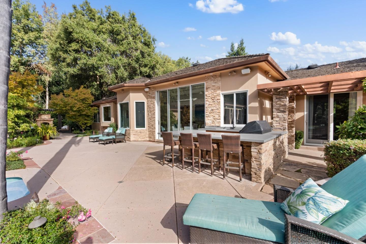 2 Lane Place Atherton, CA 94027 - Photo 34 of 35 a view of a house with backyard sitting area and garden