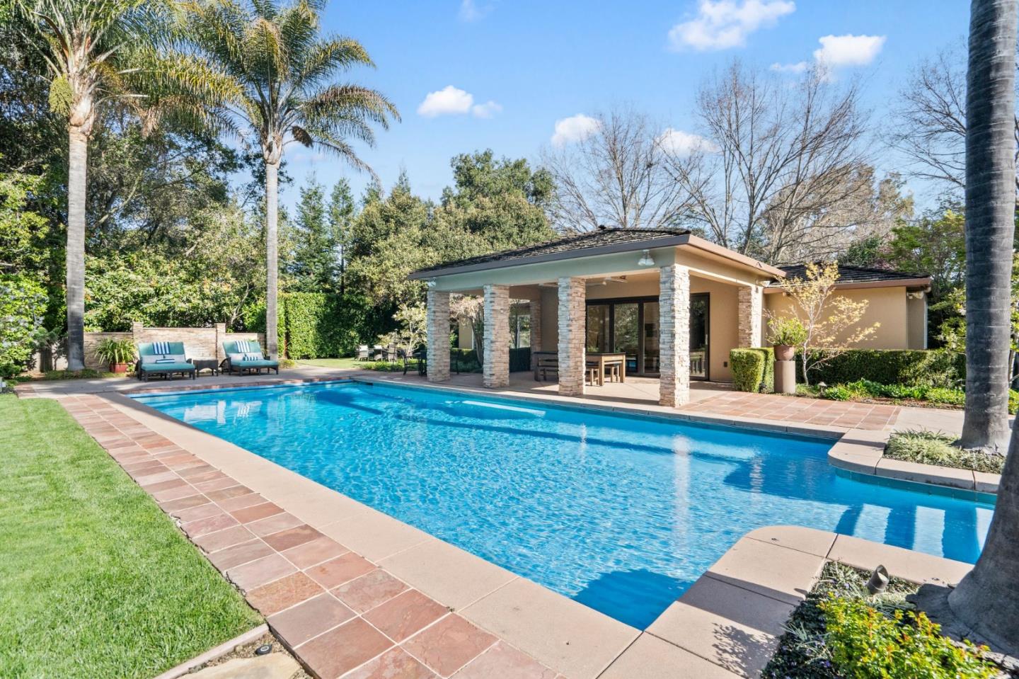 2 Lane Place Atherton, CA 94027 - Photo 4 of 35 a view of house with outdoor space and swimming pool