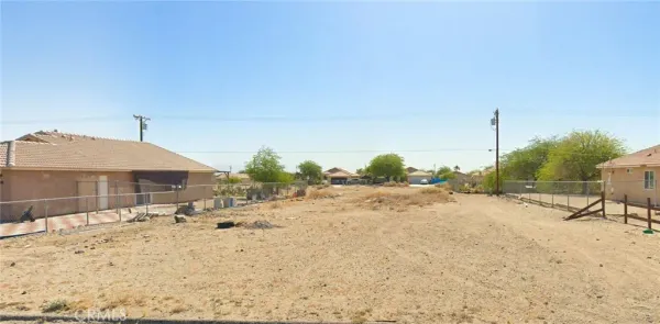 a view of a backyard of the house