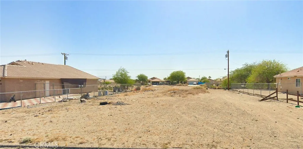 a view of a backyard of the house