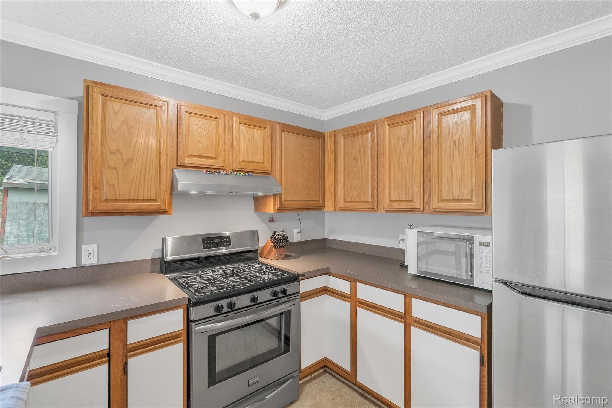 4715 Eagle Road Highland, MI 48356 - Photo 20 of 35 19-4715-Eagle-WindowStill-Real-Estate-Photography-19.jpg