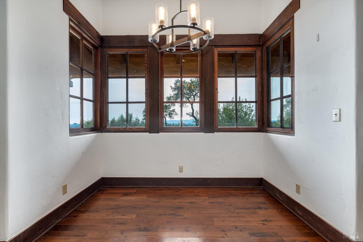 969 Rachael Road Sonoma, CA 95476 - Photo 17 of 81 a view of empty room with wooden floor and fan
