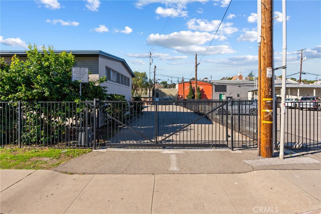 130 East Alvarado Street Fallbrook, CA 92028 - Photo 14 of 15 a view of a building with a iron fence