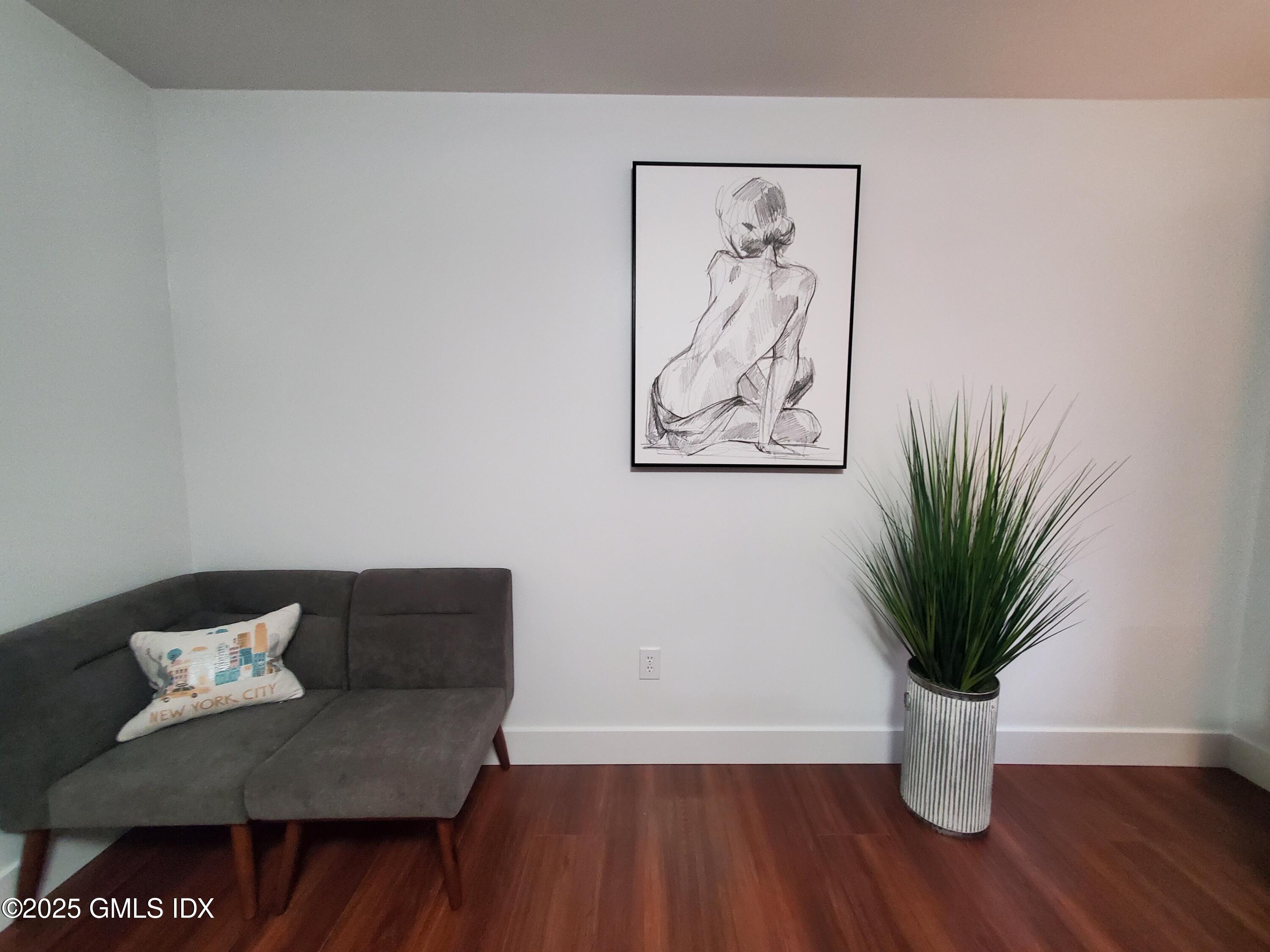 92 Valley Road, Unit A Cos Cob, CT 06807 - Photo 25 of 57 a view of a living room and wooden floor