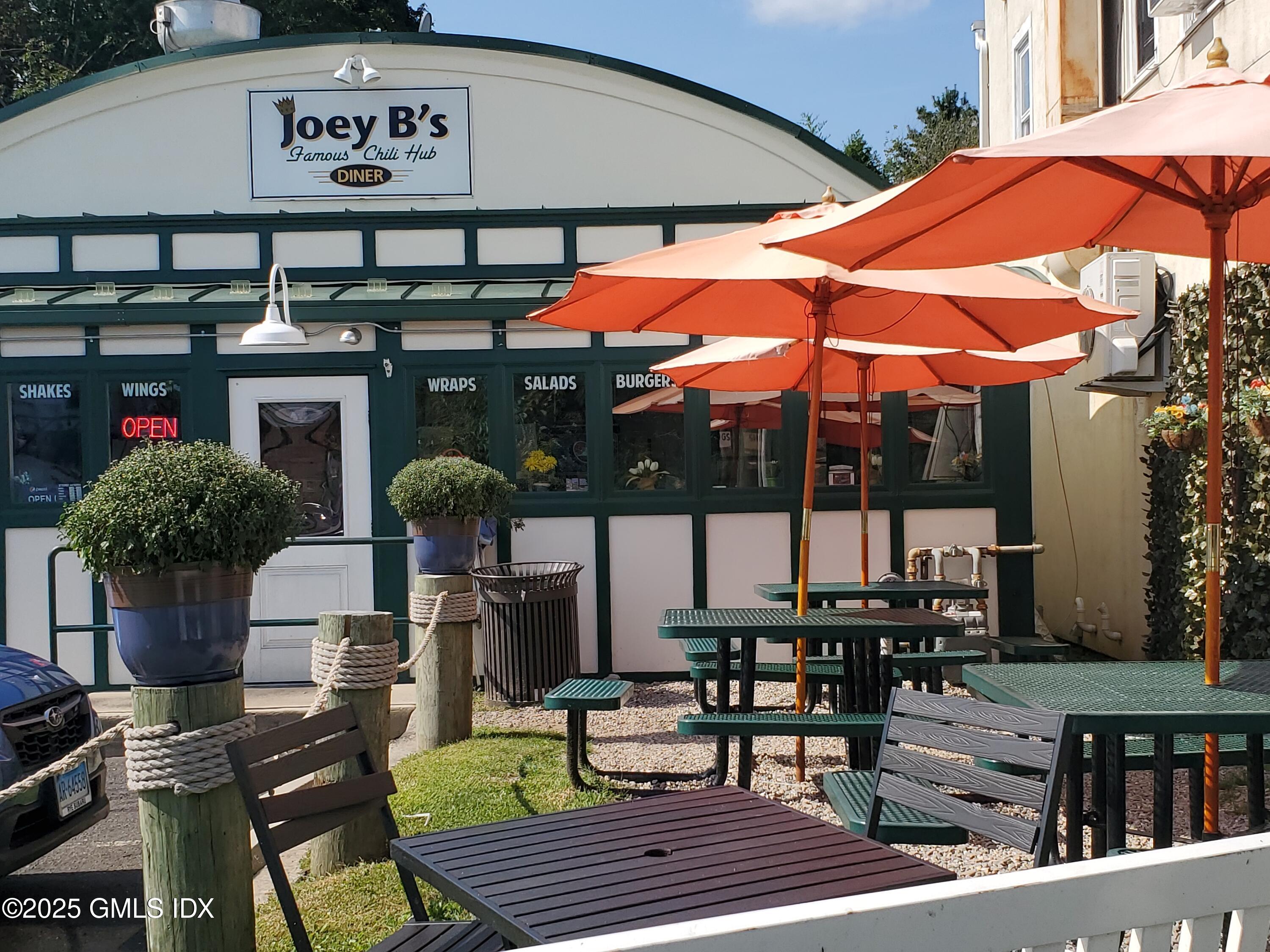 92 Valley Road, Unit A Cos Cob, CT 06807 - Photo 53 of 57 a view of a cafe with sitting area