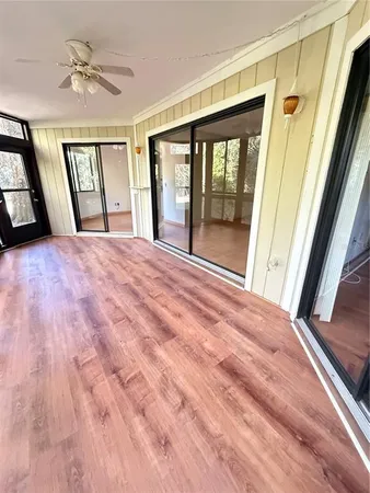 a view of an empty room with a window