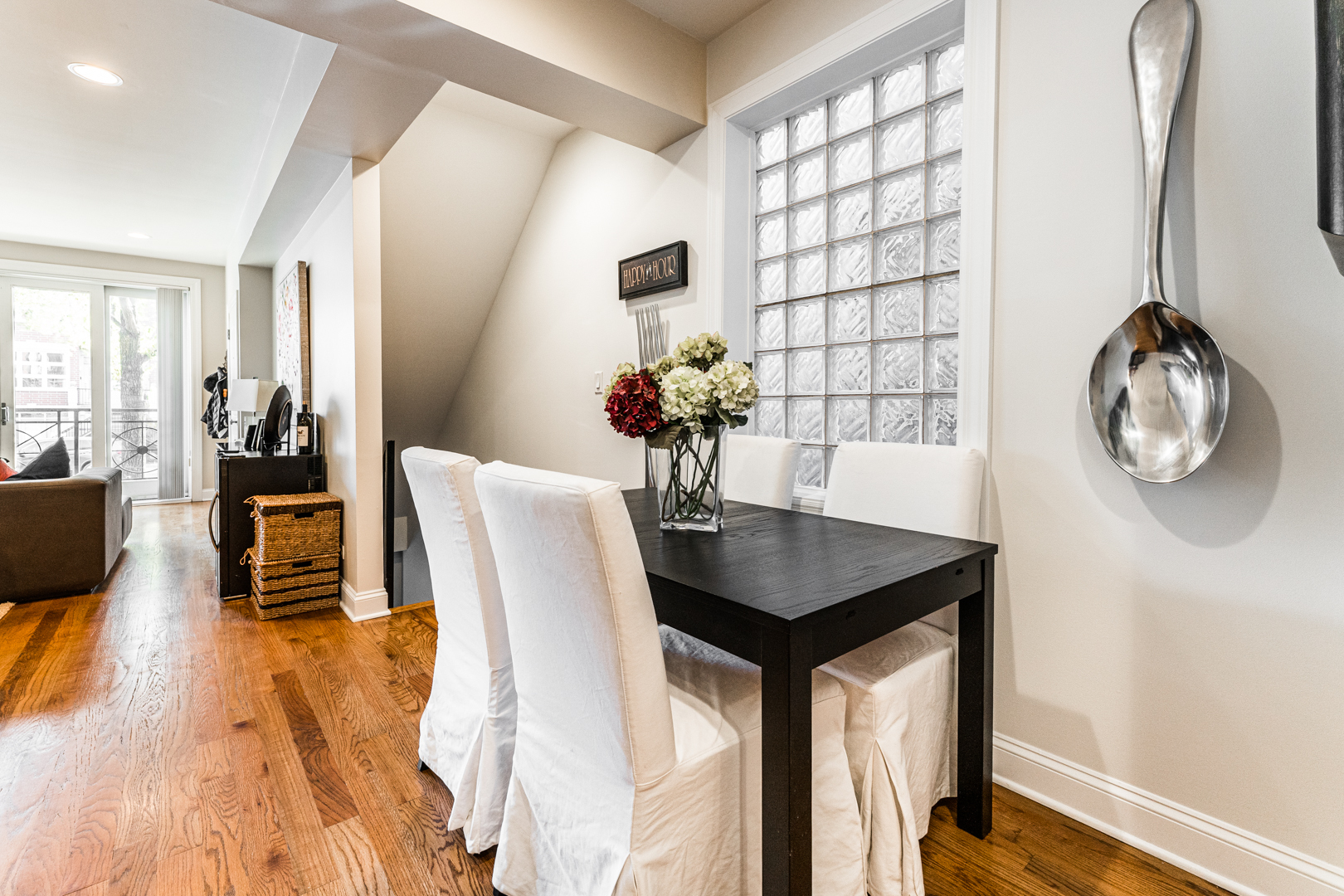 844 West Erie Street, Unit 1 Chicago, IL 60642 - Photo 13 of 37 a dining room with furniture and wooden floor