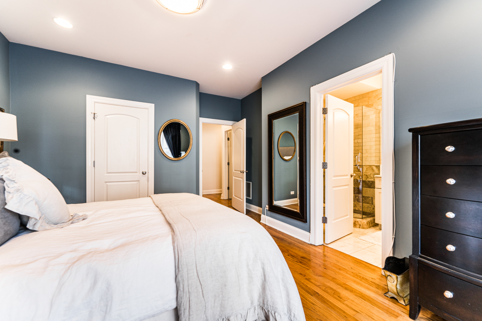 844 West Erie Street, Unit 1 Chicago, IL 60642 - Photo 18 of 37 a bedroom with a bed and a large window