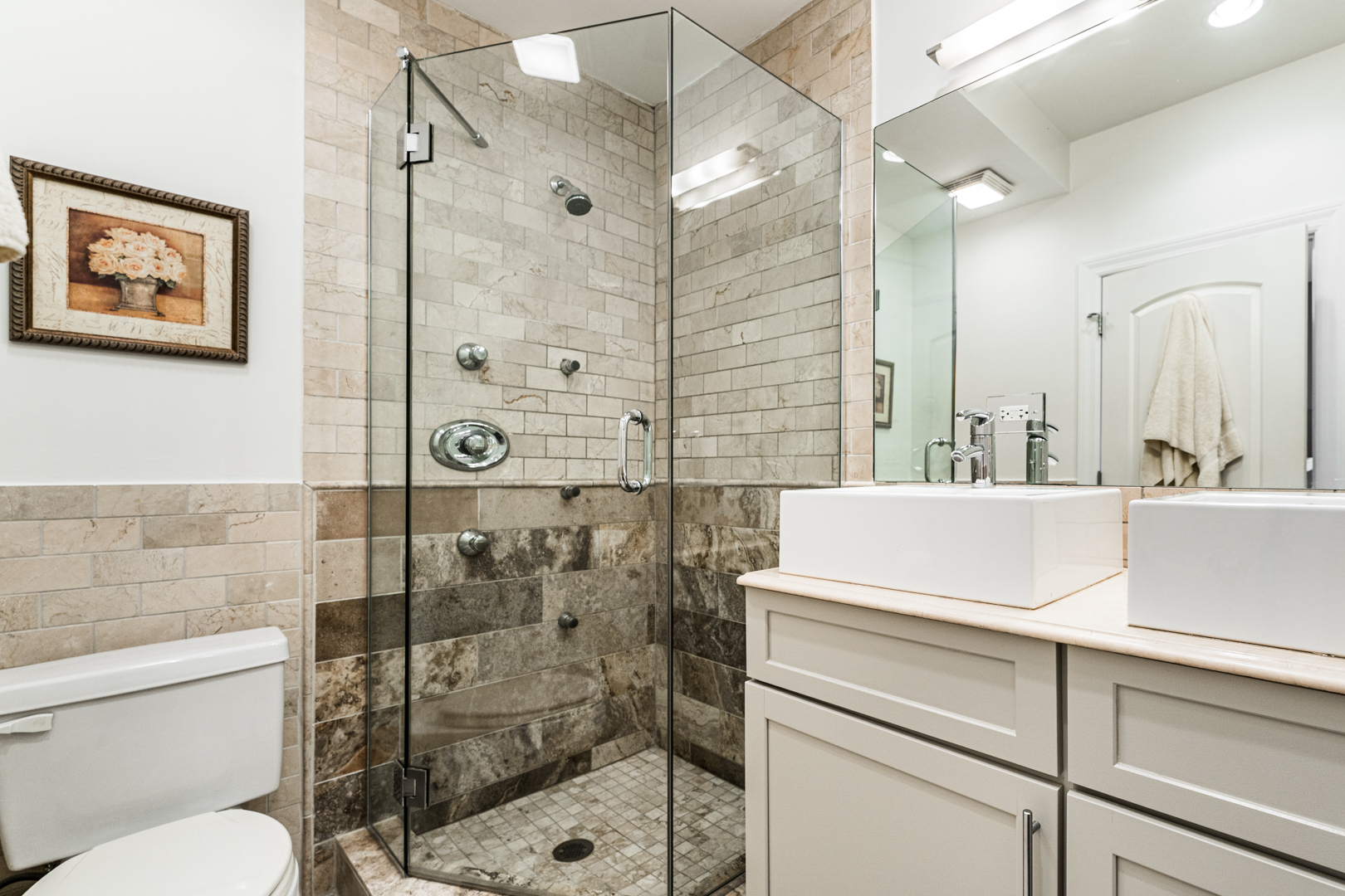 844 West Erie Street, Unit 1 Chicago, IL 60642 - Photo 21 of 37 a bathroom with a sink toilet and shower