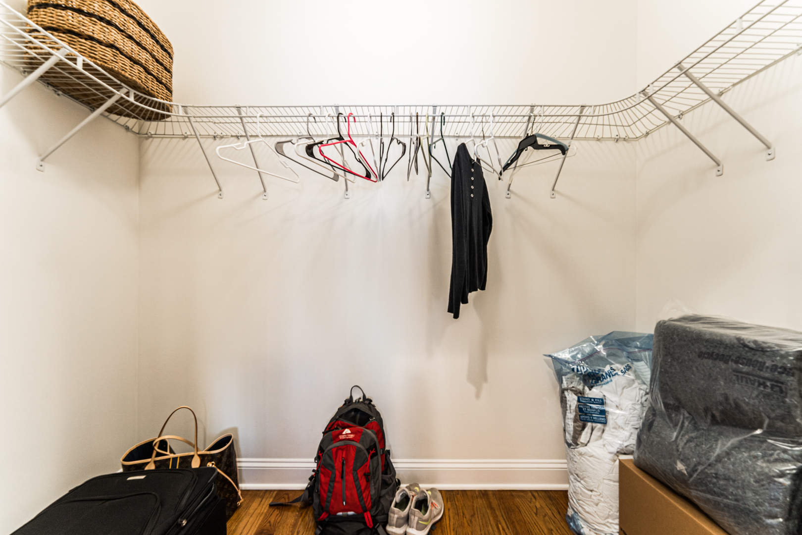 844 West Erie Street, Unit 1 Chicago, IL 60642 - Photo 22 of 37 a view of walk in closet with clothes and shoes