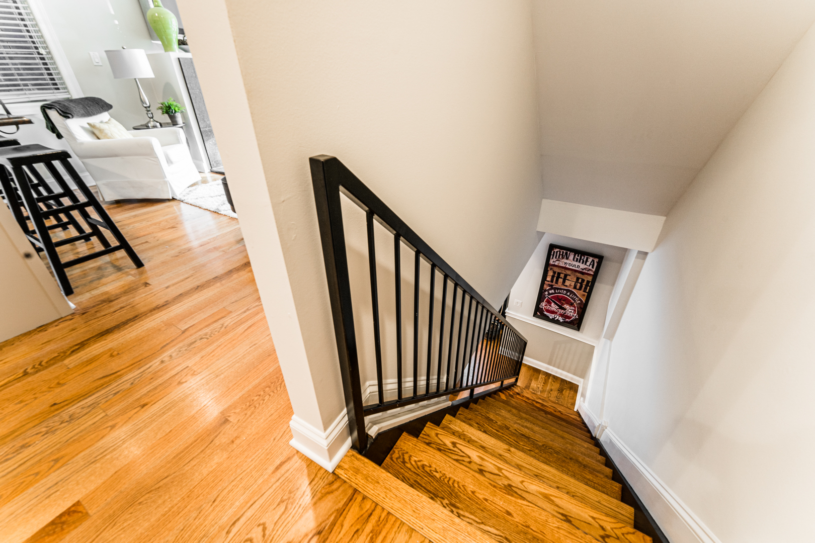 844 West Erie Street, Unit 1 Chicago, IL 60642 - Photo 27 of 37 a view of a hallway with wooden floor and stairs