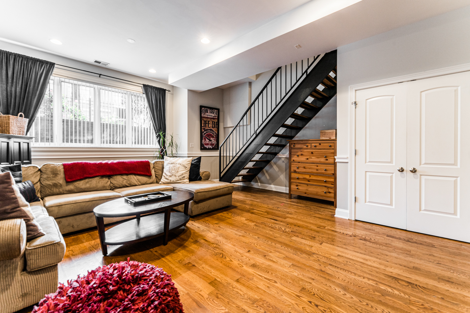 844 West Erie Street, Unit 1 Chicago, IL 60642 - Photo 29 of 37 a living room with furniture and a large window