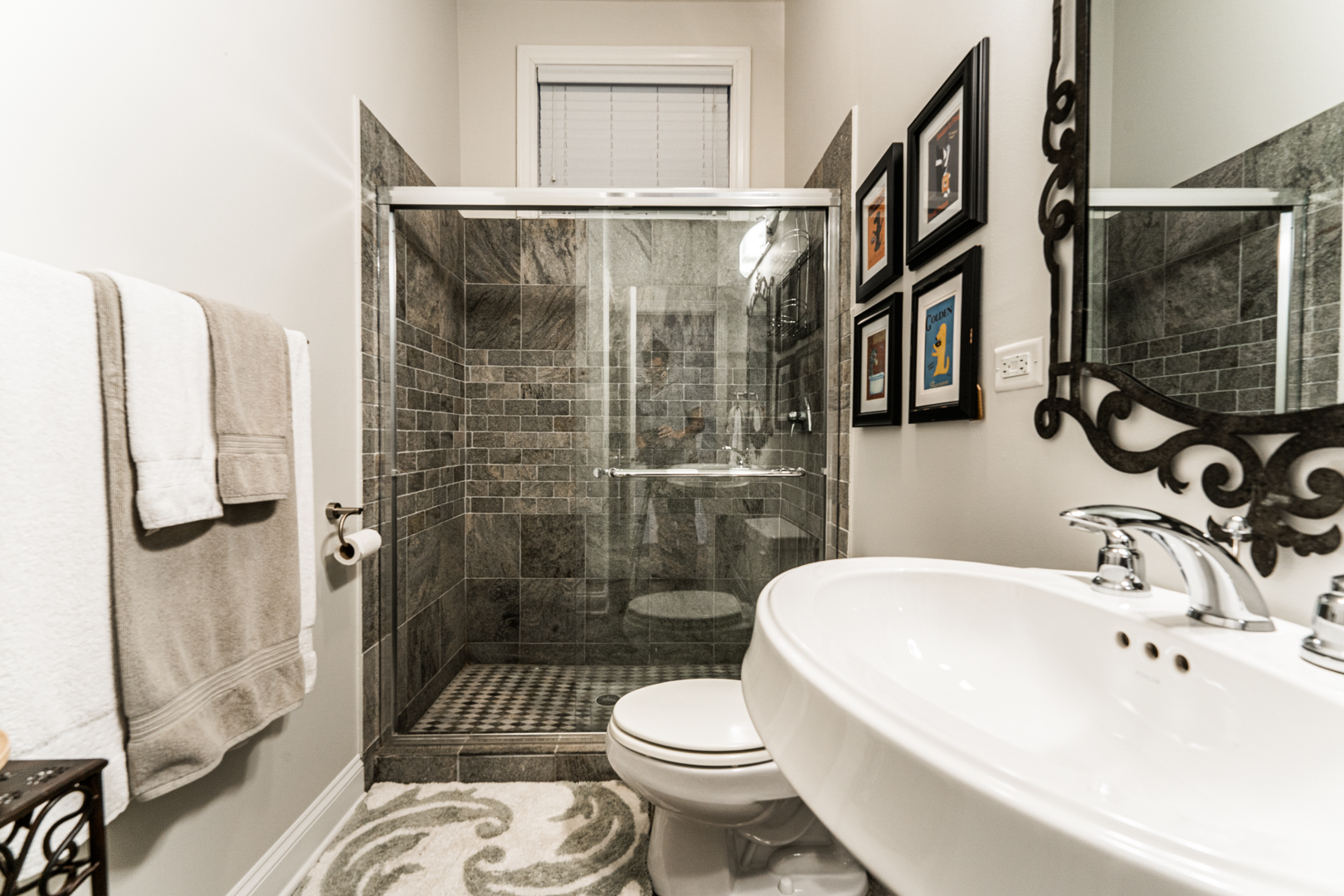 844 West Erie Street, Unit 1 Chicago, IL 60642 - Photo 32 of 37 a bathroom with a sink toilet and shower
