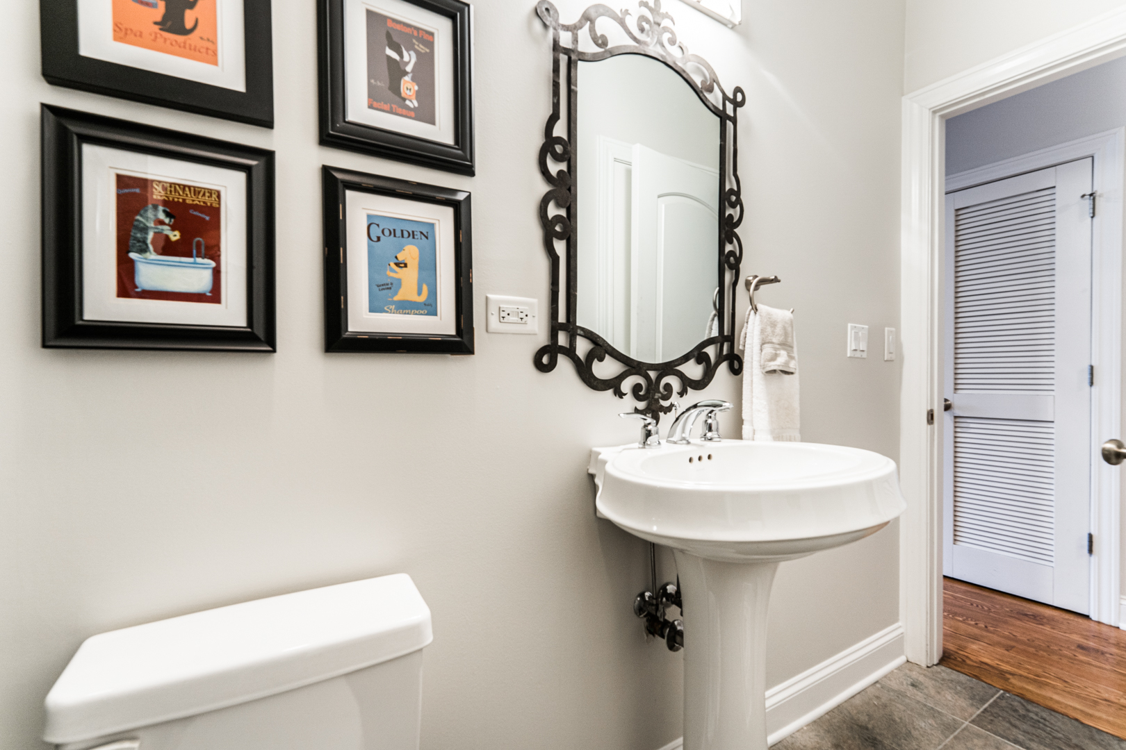 844 West Erie Street, Unit 1 Chicago, IL 60642 - Photo 33 of 37 a bathroom with a toilet sink and mirror