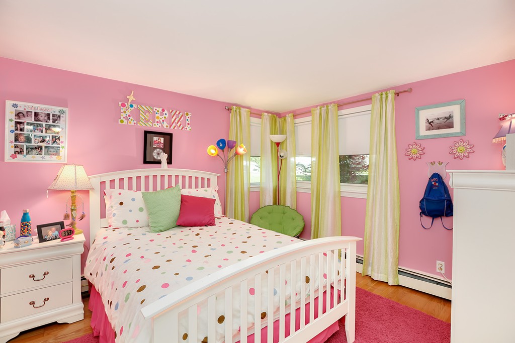4 Beaconsfield Drive Natick, MA 01760 - Photo 17 of 22 a bedroom with a bed and a dresser