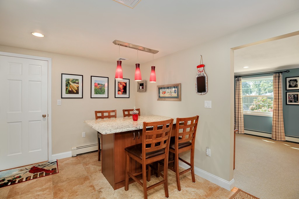 4 Beaconsfield Drive Natick, MA 01760 - Photo 7 of 22 a view of a dining room with furniture