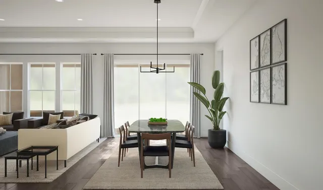 a dining room with furniture and window