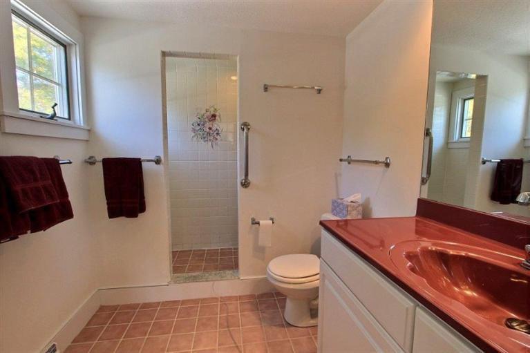 149 Leeward Road Bourne, MA 02532 - Photo 13 of 35 a bathroom with a sink toilet and shower