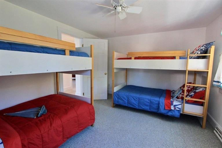 149 Leeward Road Bourne, MA 02532 - Photo 17 of 35 a bedroom with a bed and a window