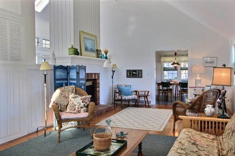 149 Leeward Road Bourne, MA 02532 - Photo 2 of 35 a living room with furniture and a fireplace