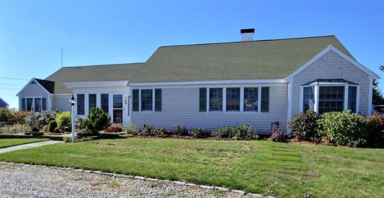 149 Leeward Road Bourne, MA 02532 - Photo 24 of 35 front view of a house with a yard