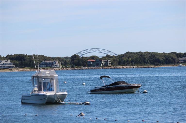 149 Leeward Road Bourne, MA 02532 - Photo 26 of 35 a view of a lake with a car parked