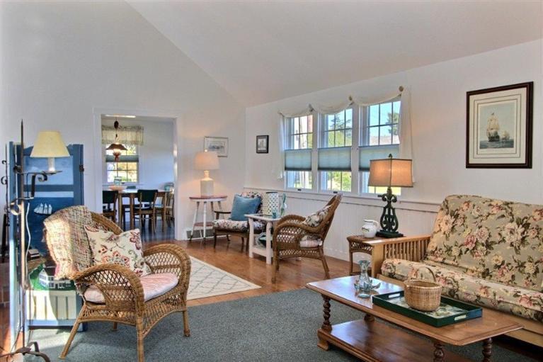 149 Leeward Road Bourne, MA 02532 - Photo 3 of 35 a living room with furniture and wooden floor