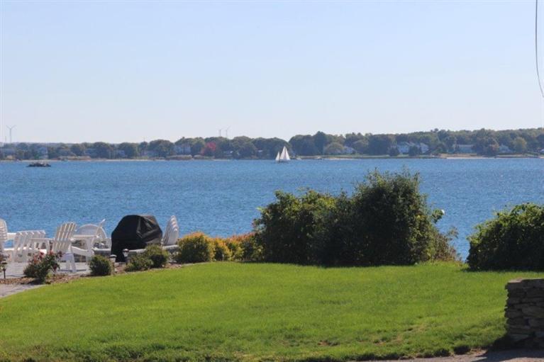 149 Leeward Road Bourne, MA 02532 - Photo 33 of 35 a view of a field with a yard