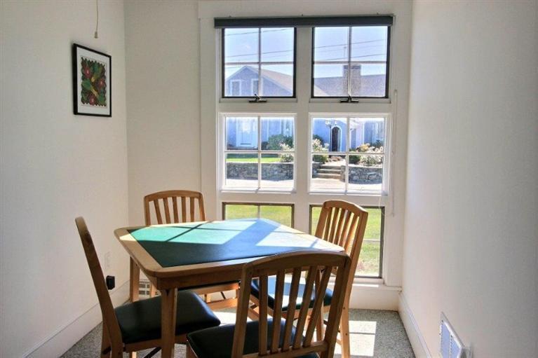 149 Leeward Road Bourne, MA 02532 - Photo 8 of 35 a view of a dining room with furniture and window