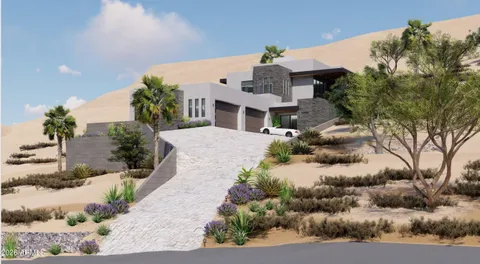 a view of a white building among the palm trees
