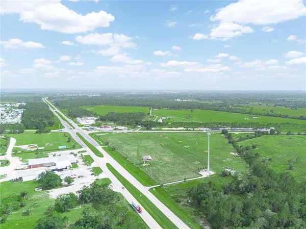 a view of a city and lush green space