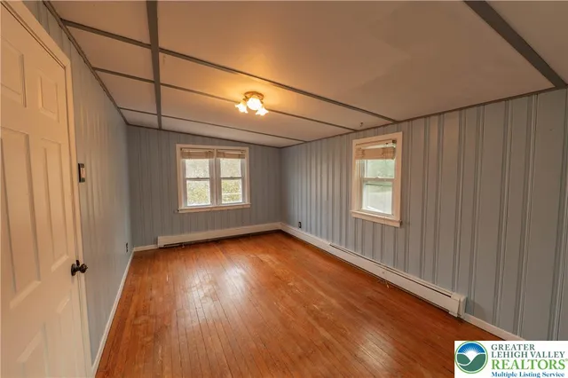 a view of a house with a street