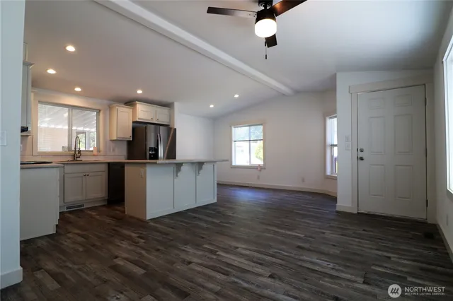 a view of kitchen with wooden floor
