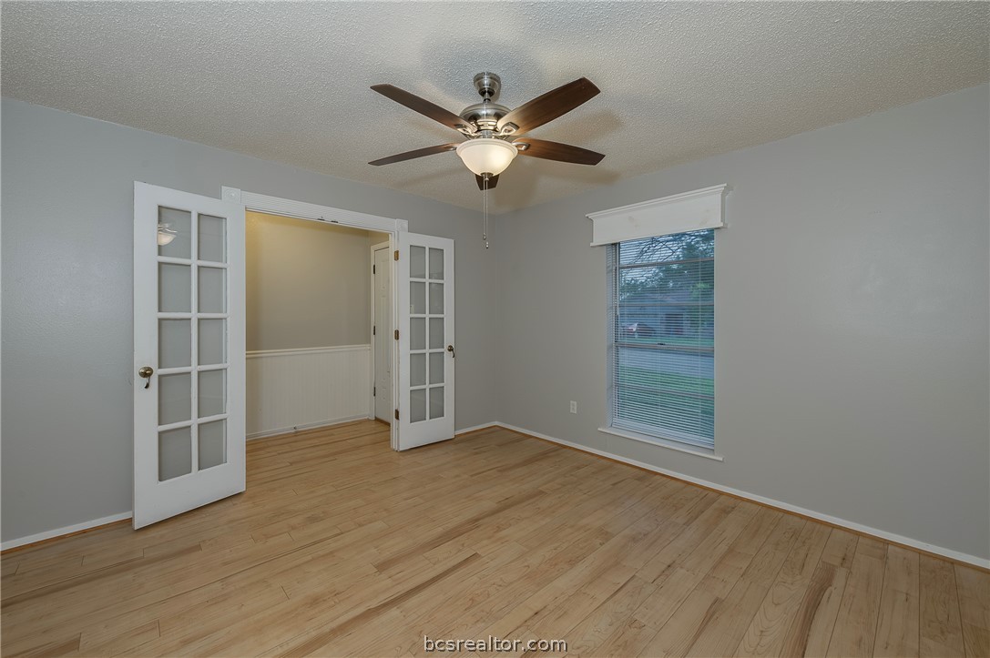 2303 Avon Street Bryan, TX 77802 - Photo 3 of 32 Bonus room features include Double Panel Doors- Wood trim window valance & laminate wood flooring