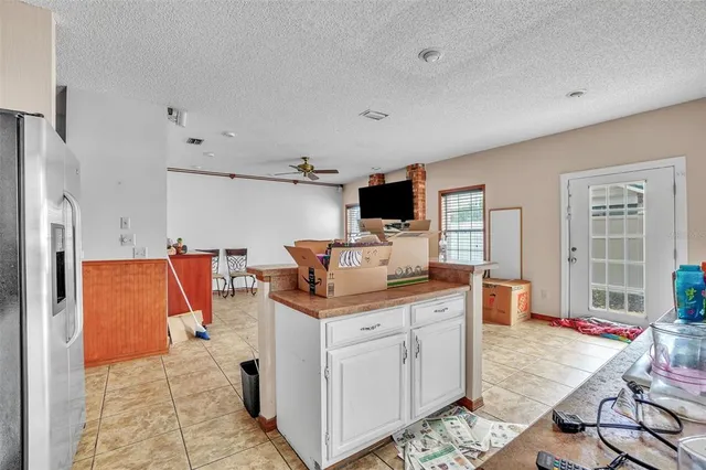 a view of kitchen with counter top space and appliances