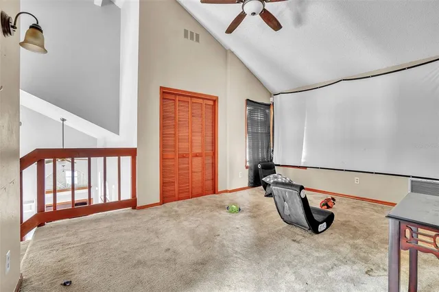 a view of livingroom with furniture and window