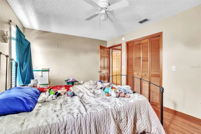 a view of an empty room with windows